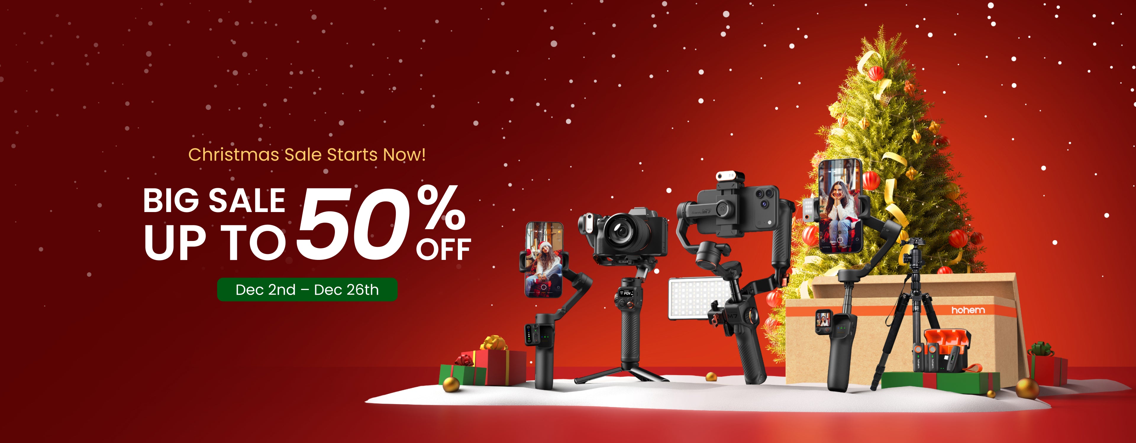 Hohem Christmas Sale banner showing up to 50% off gimbals, including camera and smartphone stabilizers displayed beside a decorated Christmas tree.
