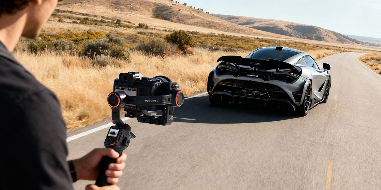 Hohem iSteady MT3 Pro AI camera gimbal tracking a moving car during outdoor filming
